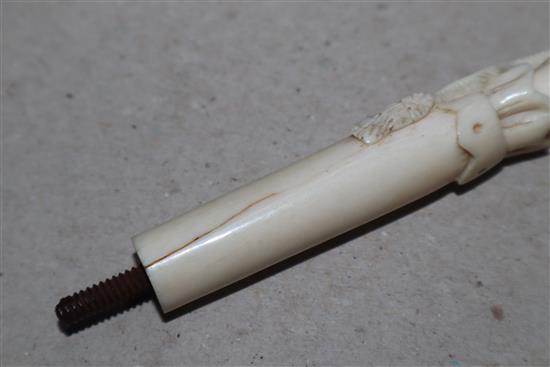 A Victorian ivory parasol handle